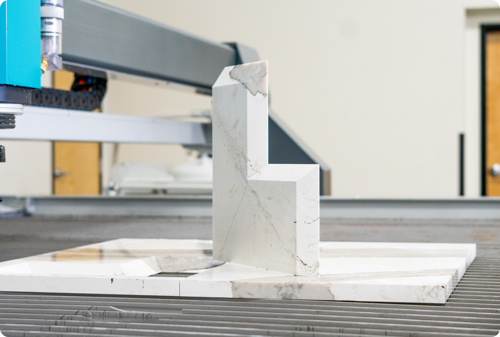 A waterjet cutting a beveled edge in metal
